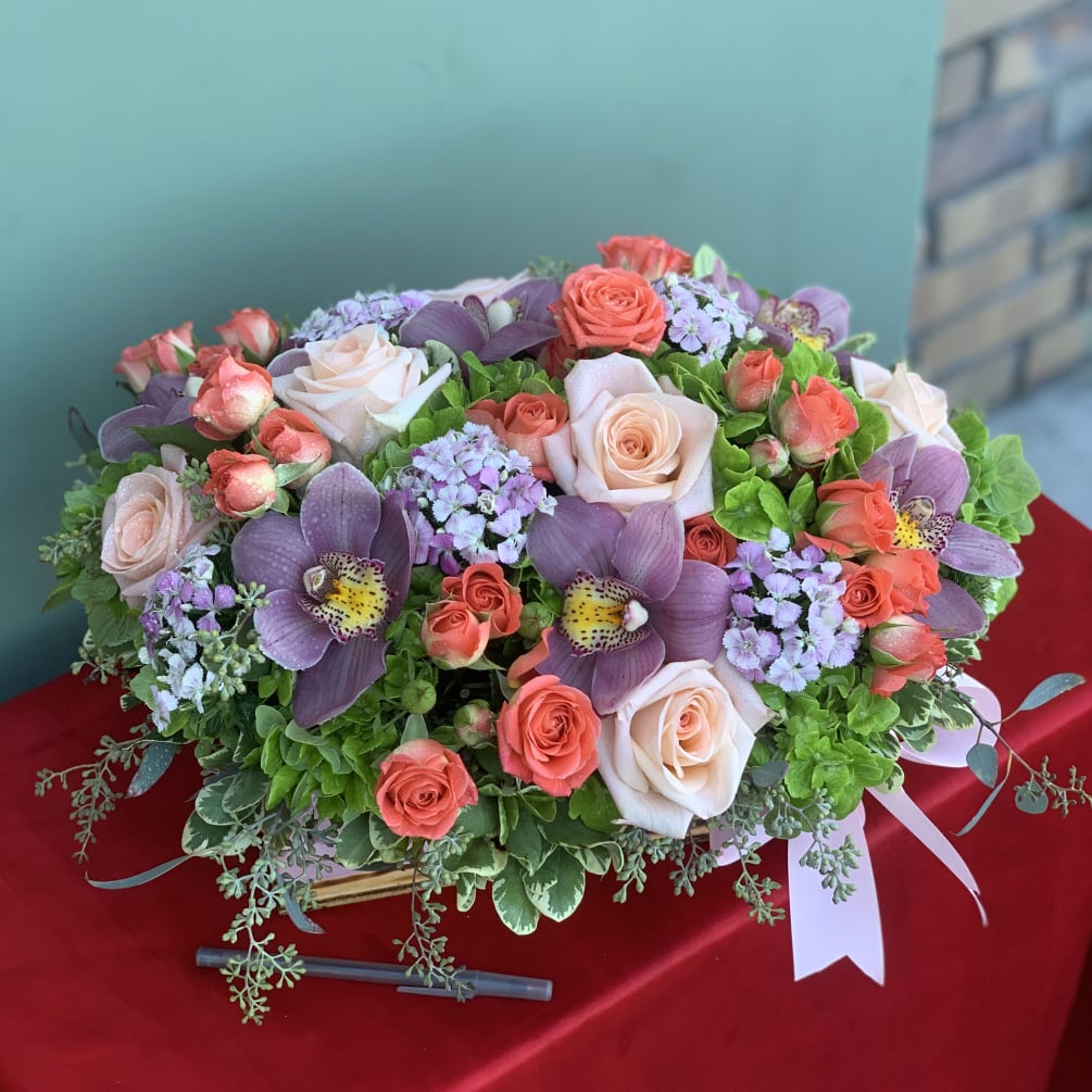 A perfect way to celebrate any occasion with this modern arrangement filled