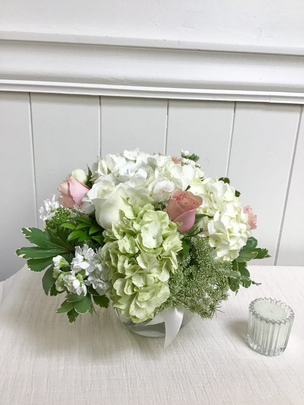 How pretty: Premium hydrangea, chartreuse mini-hydrangea and soft pink and white roses