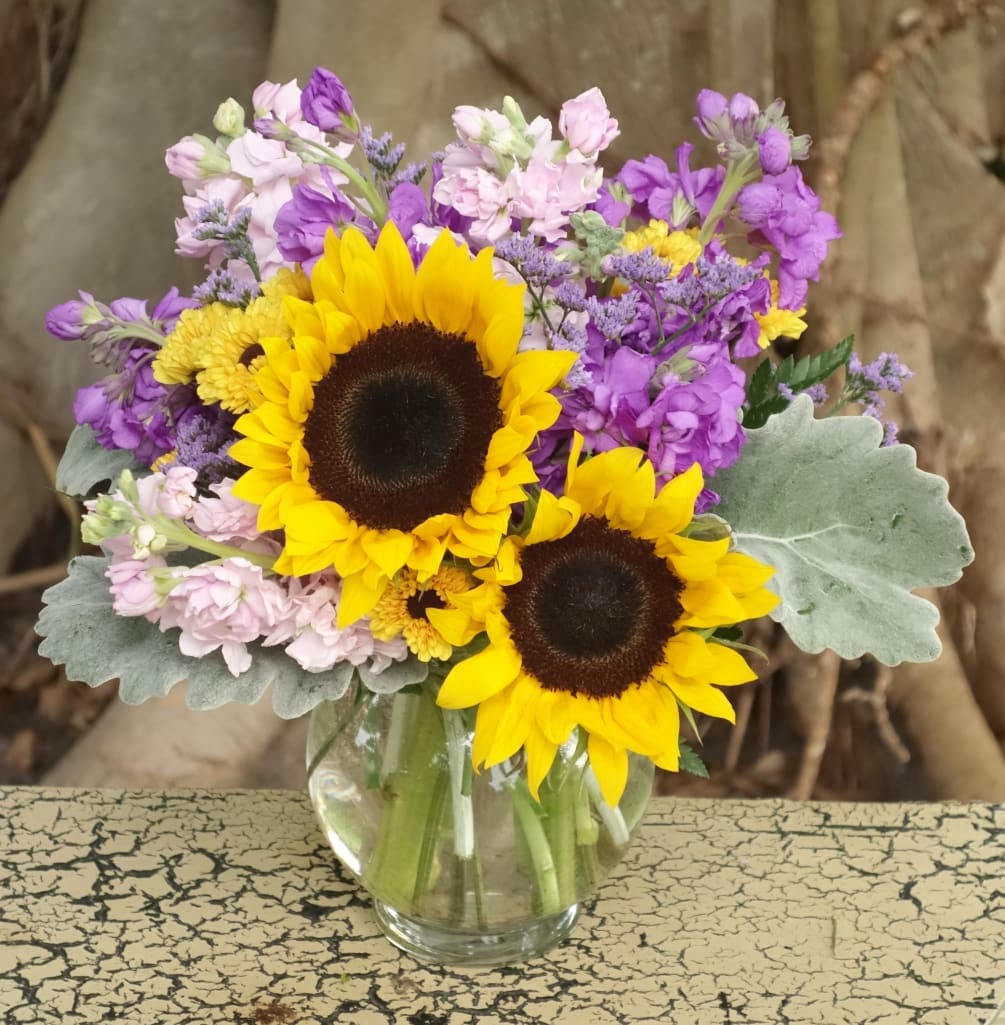Sweetly scented stock with popping perfect sunflowers.  This bouquet is simple