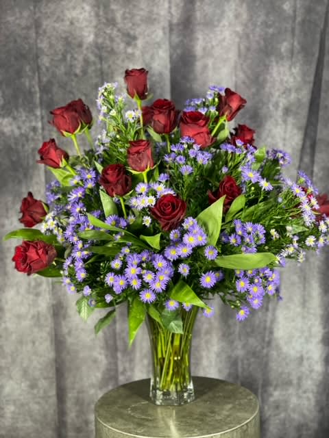 4 dozen Roses of your choice of color depending on availability. Astor