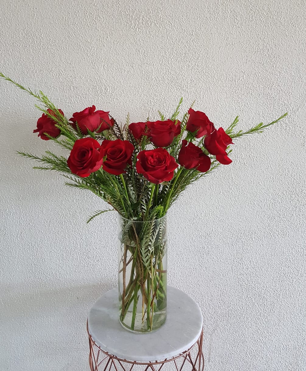 A modern and minimal style of the traditional dozen red roses for