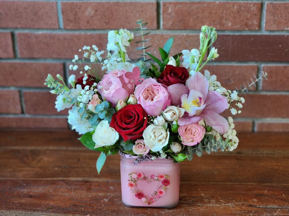 Send a gorgeous Valentine arrangement to your lived one in a cute
