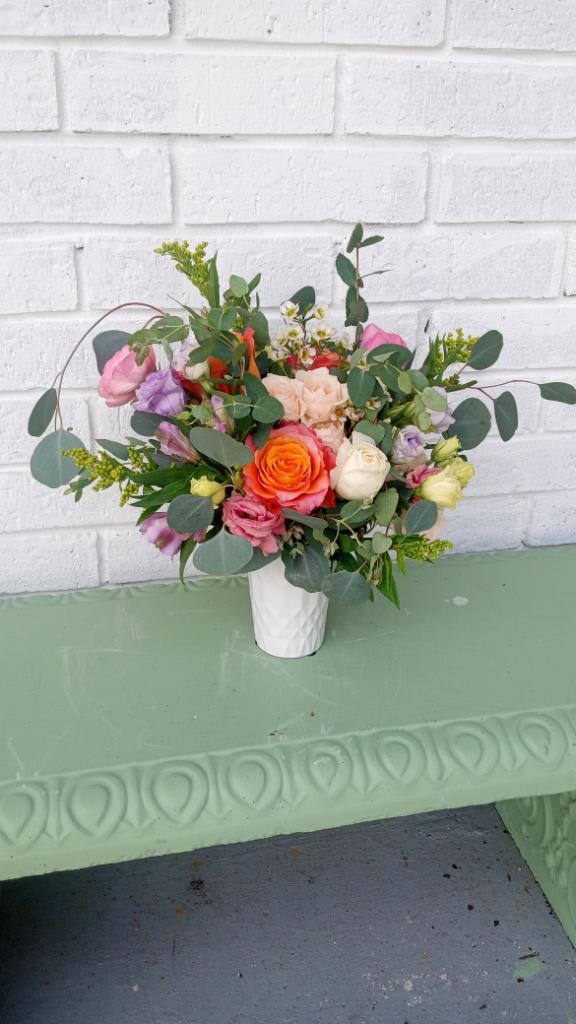 this beautiful floral is filled with a variety of flowers 