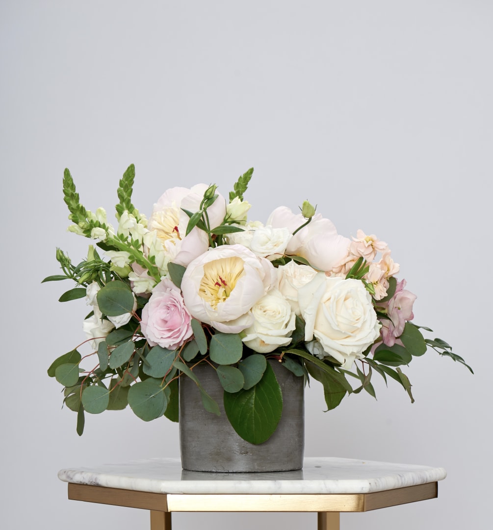 Seasonal peony, white garden roses, fragrant flowers, lisianthus, and eucalyptus. Send Mom