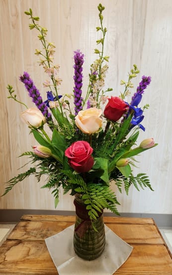 Our Designer chooses available flowers for the best value in a custom
