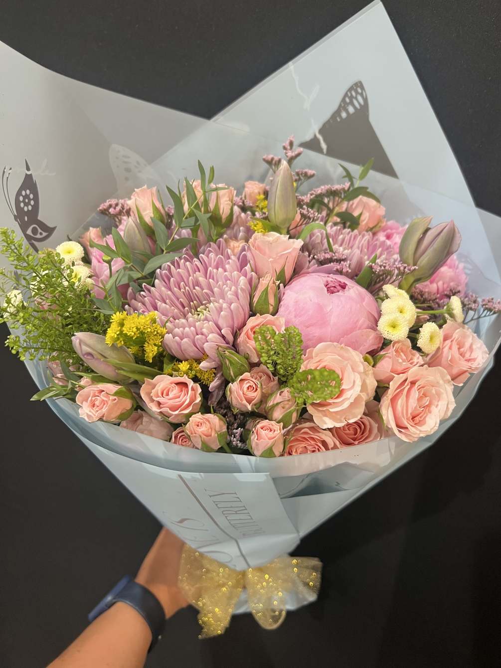Beautiful bouquet of flowers peonies,tulips,spray roses and more mix of flowers to