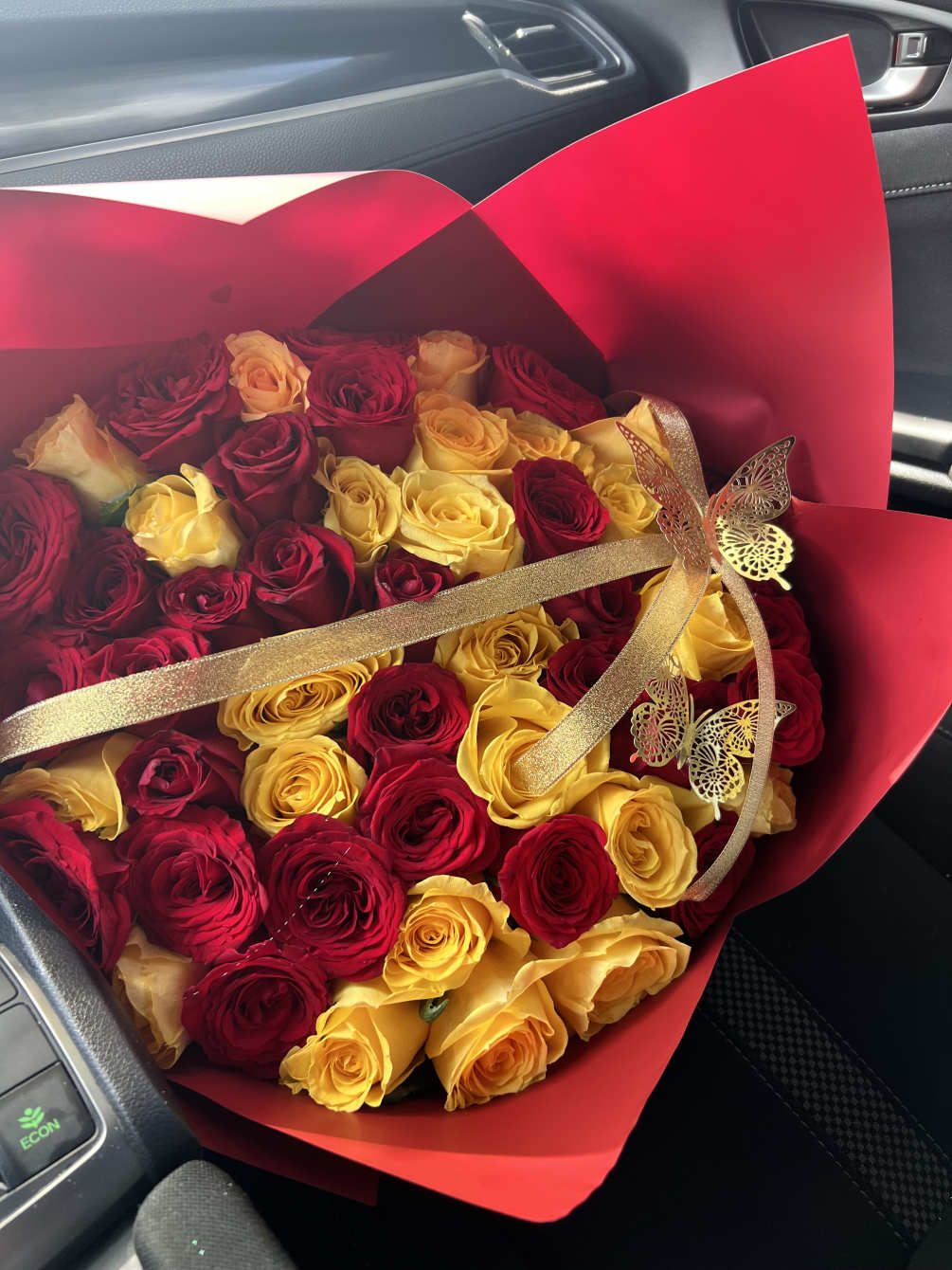 Beautiful bouquet of roses 50 yellow roses and 50 red roses with