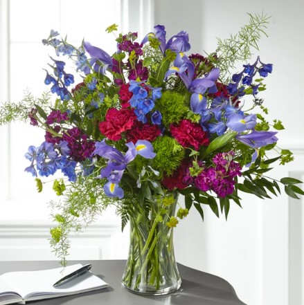 Elegantly designed with a modern mix of wildflower blooms, this bouquet expresses