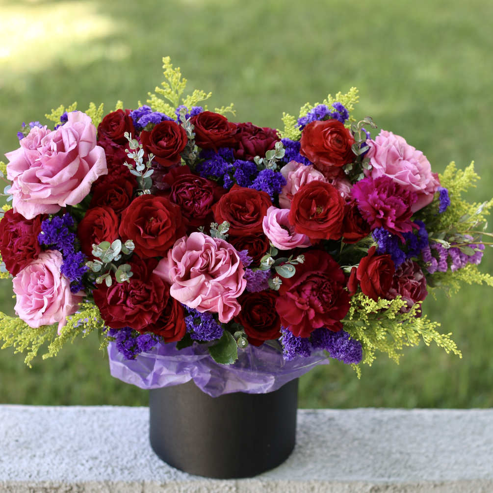 Our Passionate Petals bouquet in a box is a stunning arrangement that