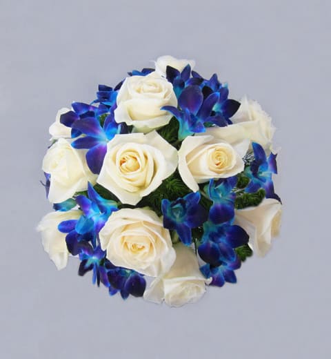 This Bridal Bouquet is a collection of seasonal flowers (all white or