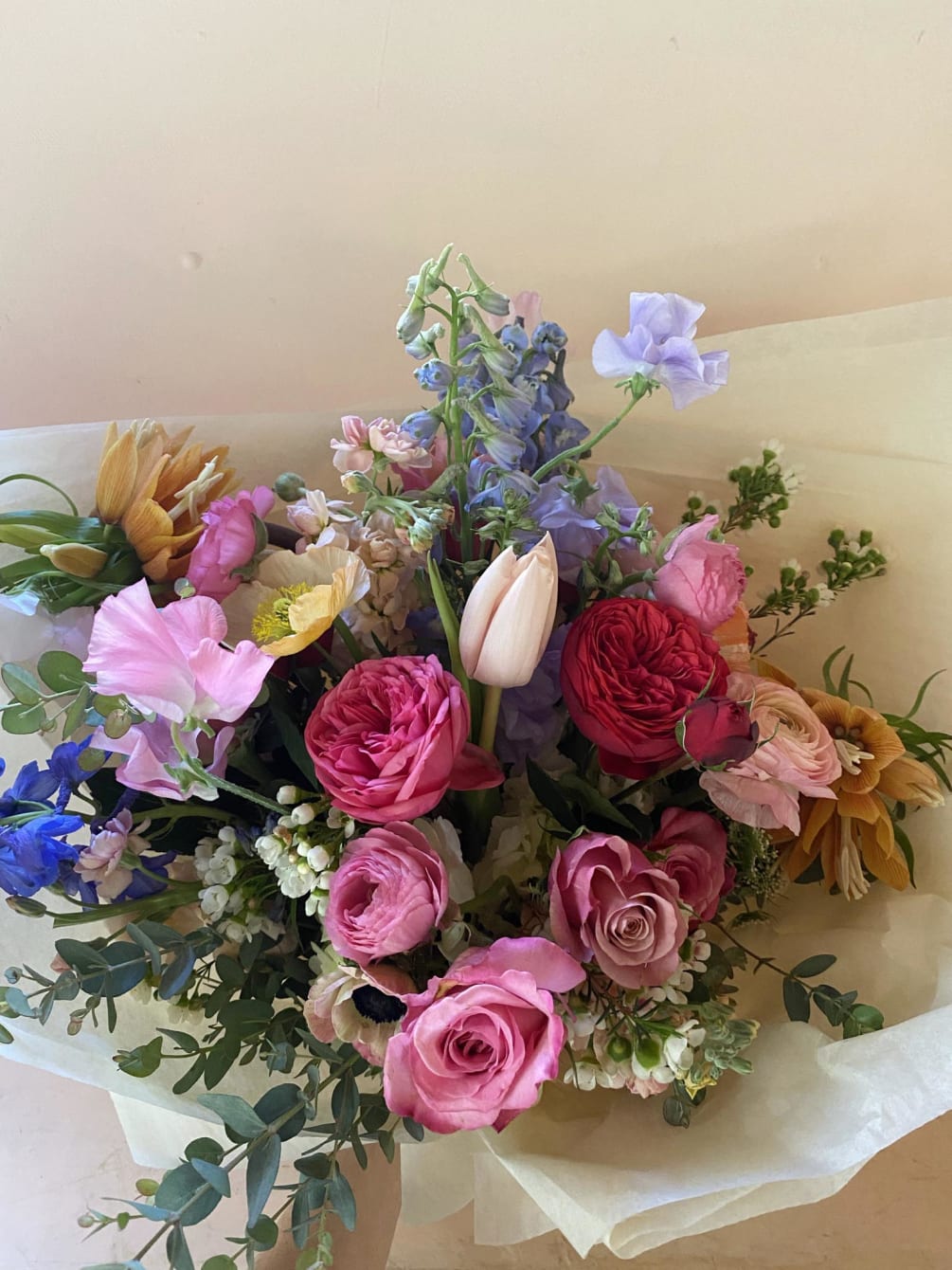 Lovely and joy bringing hand tied bouquet of pretty bright colors of