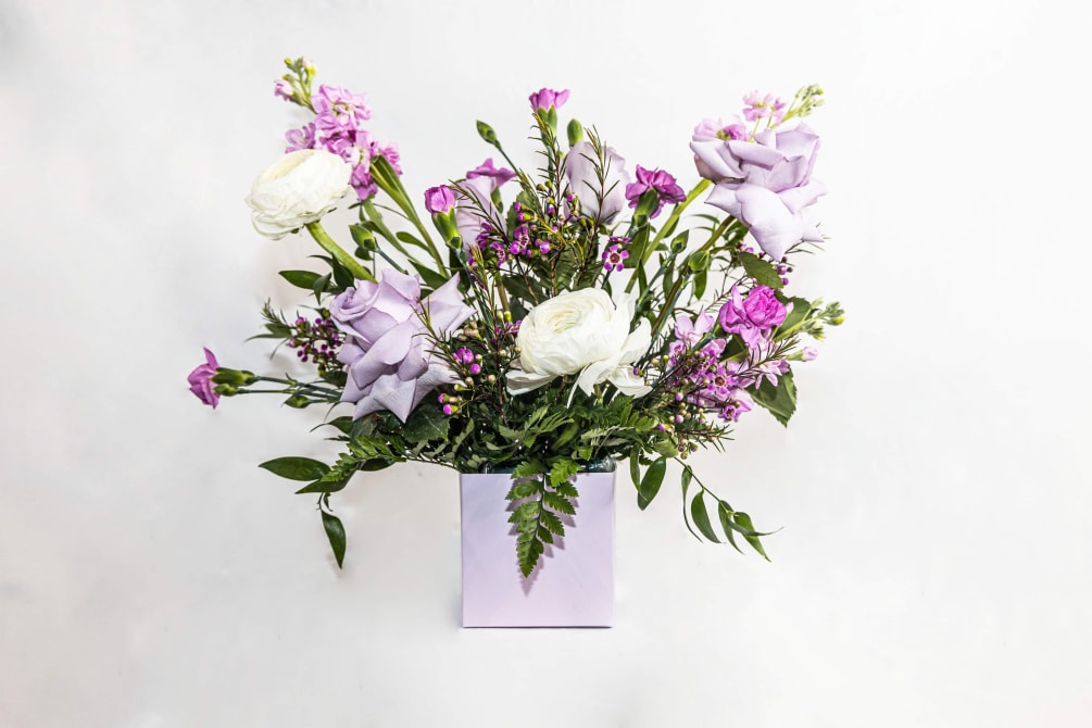 An arrangement of mixed flowers to coordinate with the color of the