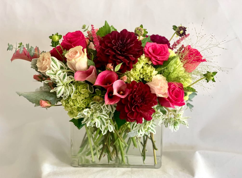 A designers choice of stunning flowers that includes roses, hydrangeas and premium