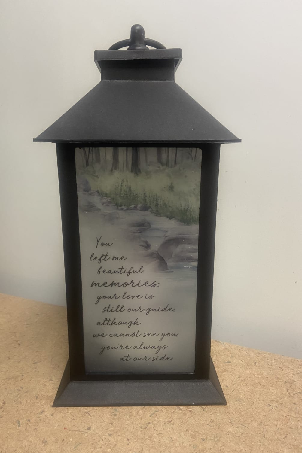 This beautiful black high quality polyresin finish lantern surrounds an interior of