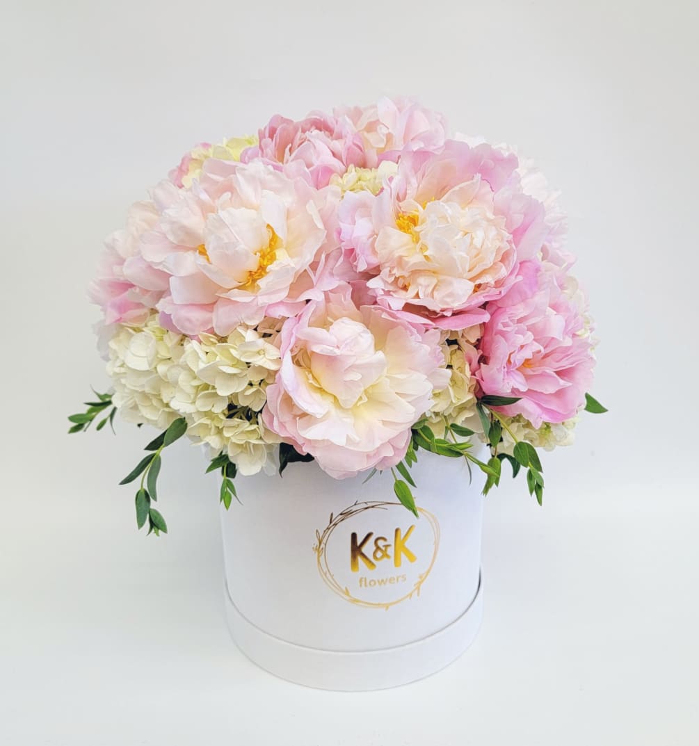 Beautiful hat box arrangement with white hydrangeas and pink peonies. PEONIES&#039; SHADE