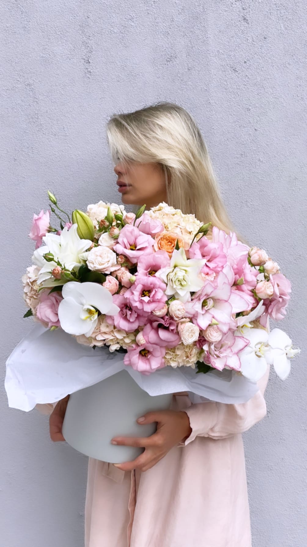 Beautiful and amazing flower arrangement in pale pink flowers