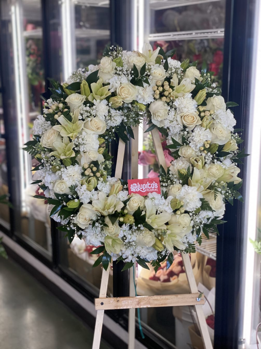 A mixture of White Flowers from what is in stock. 3 sizes
