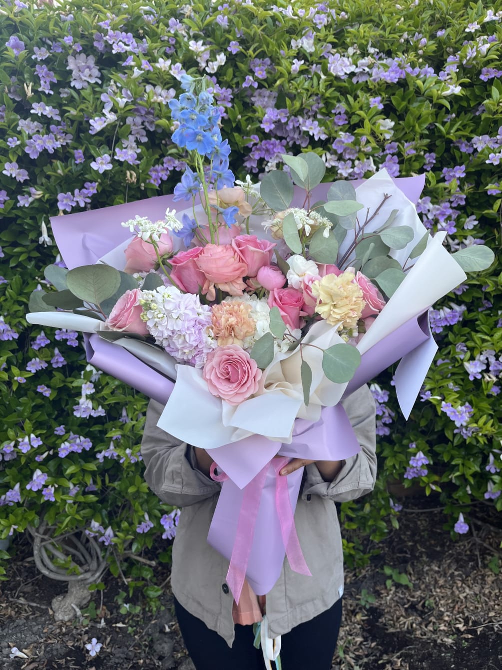 Bouquet with variety of flowers in the pastel palette 