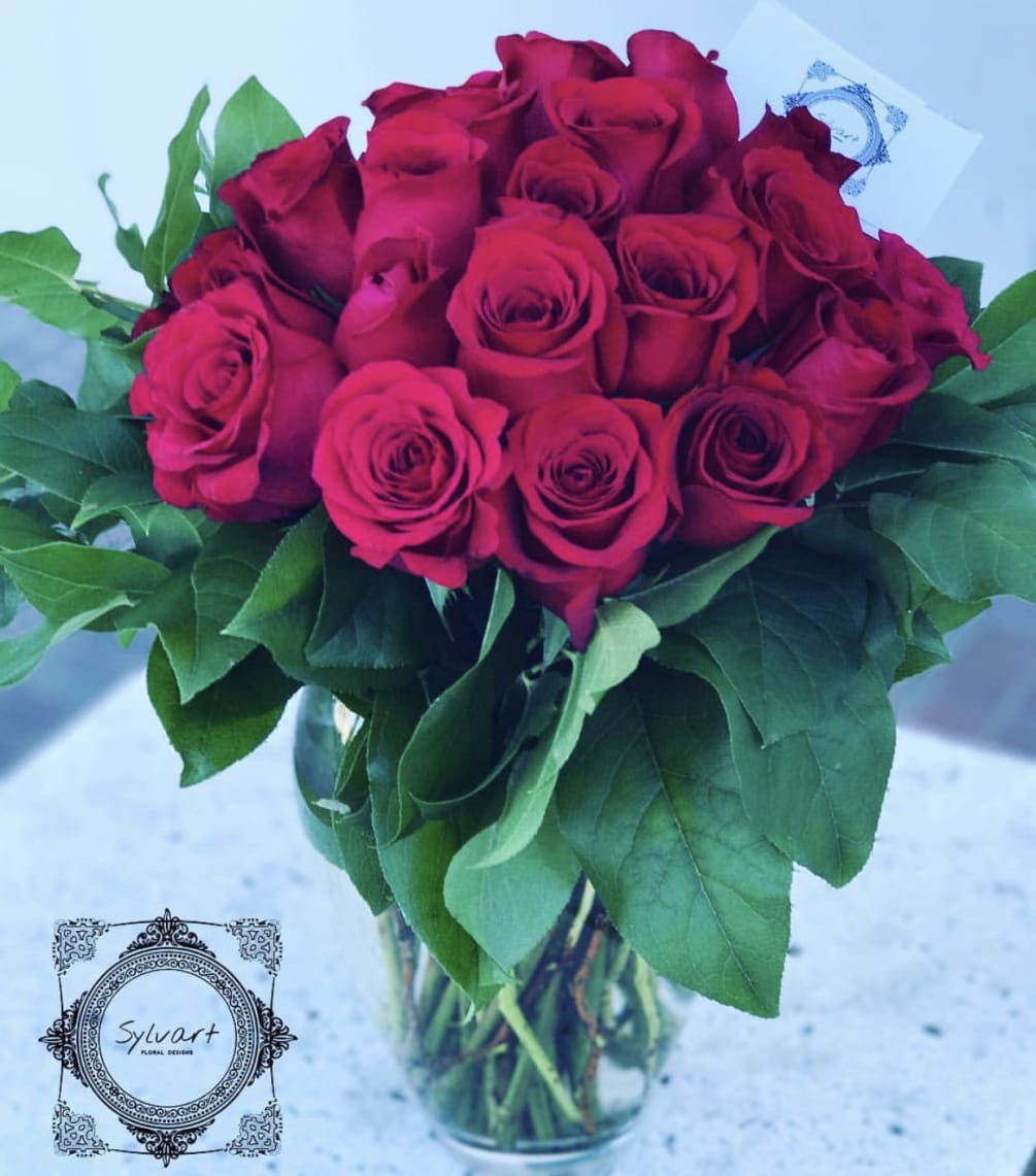 Two Dozen Roses by Sylvart Floral Designs