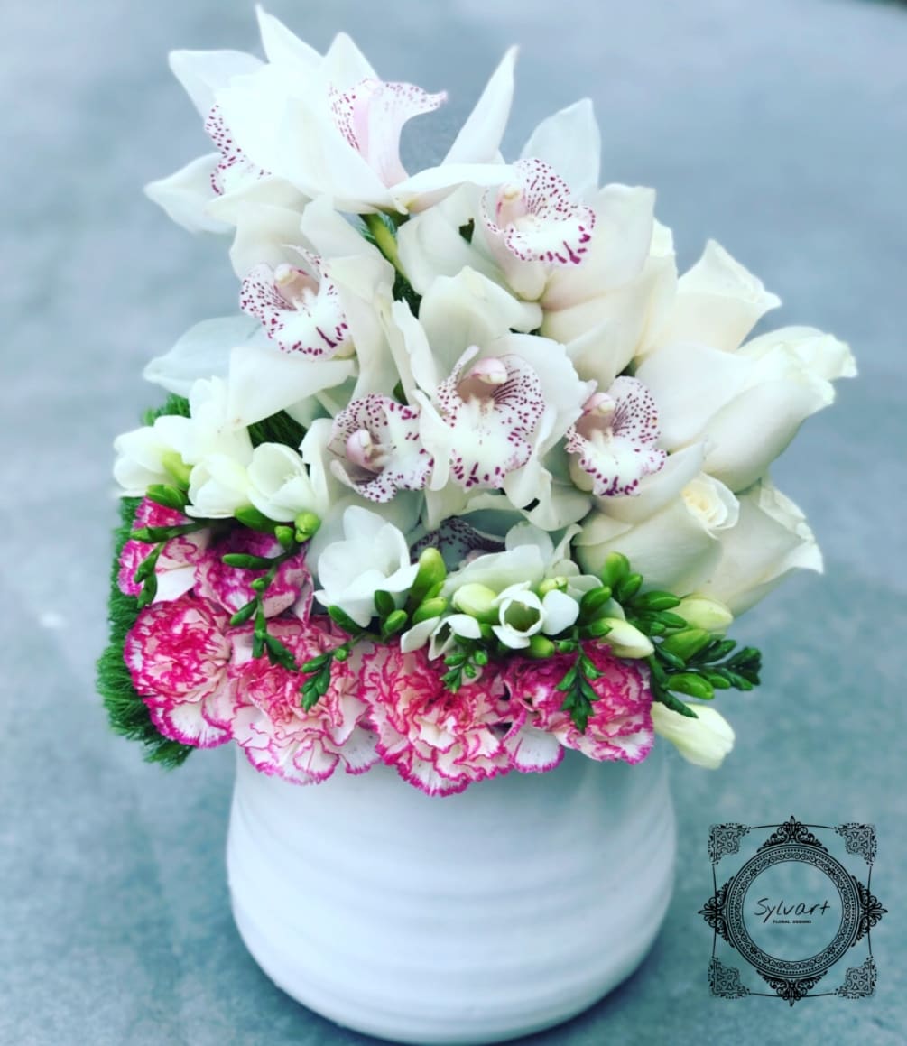 This is the Winner today! Freesia, Cymbidium Orchids, Mini Carns, Dusty Miller