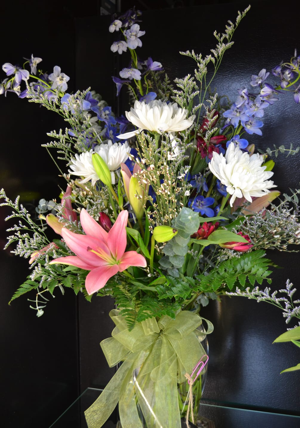 Asiatic Lilies, Delphiniums, Alstro, White mums, Eucalyptus and more