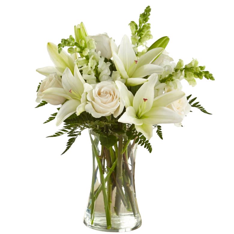 A Simply Beautiful Arrangement Of White Blossoms Provides An Expression Of Sympathy