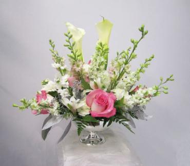 Silver anniversary centerpiece with Hydrangea, roses, calla lilies, carnations, larkspur, alstromeria, stock