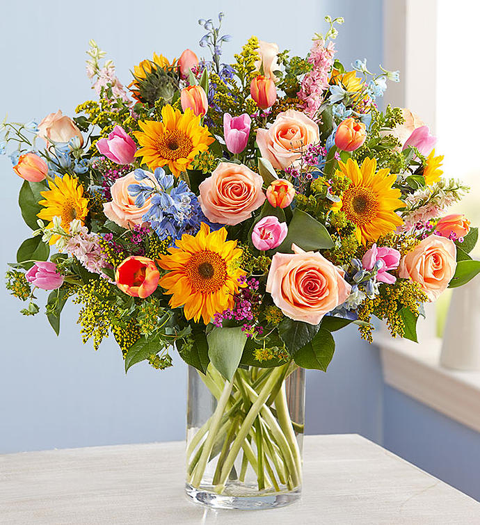 Mix summer flowers in cylinder