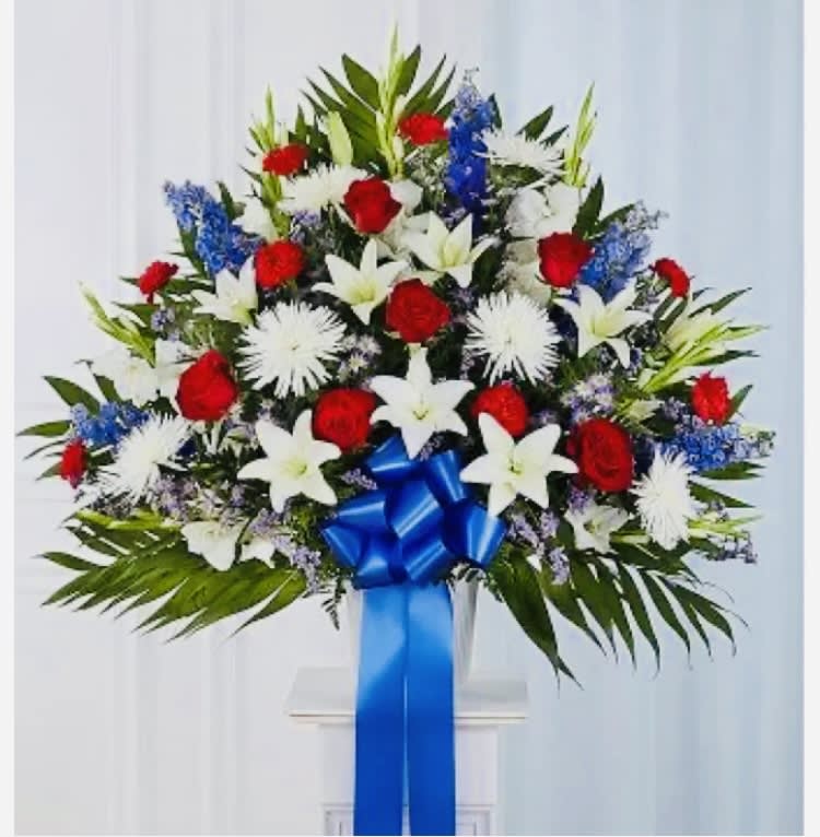 Beautiful arrangement designed with White &amp; Red roses, White Stock &amp; Lilies