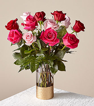 This elegant, sophisticated bouquet combines classic Valentine&#039;s Day roses with a pop