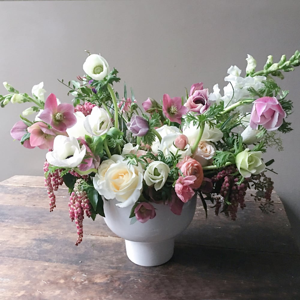 A harmony of garden beauties in this floral design will bring a