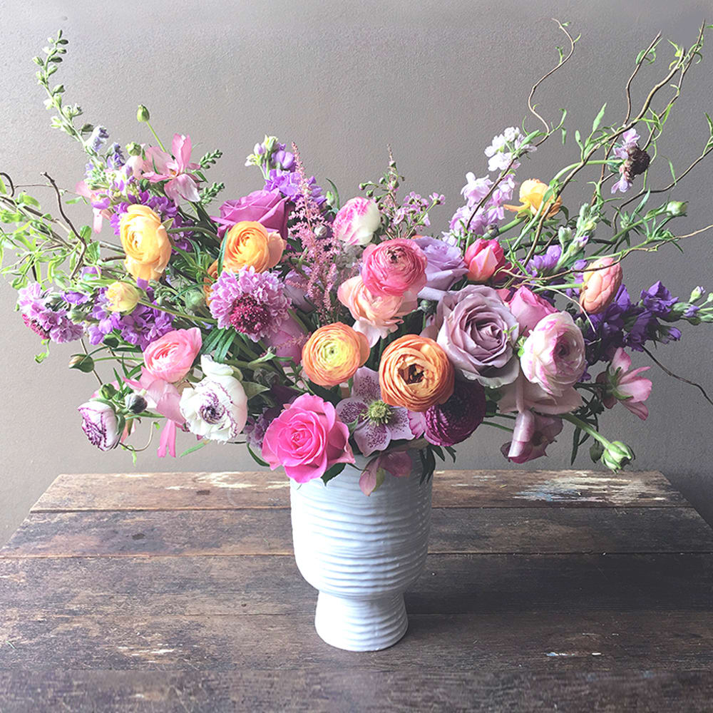 Send this glorious Spring bouquet filled with love and delight! With roses