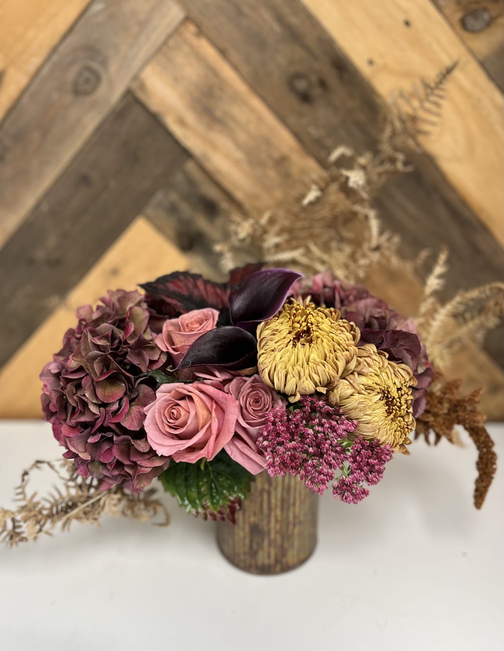 Our Fall Feminine arrangements are designed with moody rich color palettes that