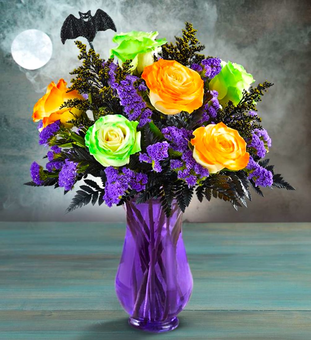 Surprise them with these orange and green Halloween rose arrangement.

A spooktacular rose
