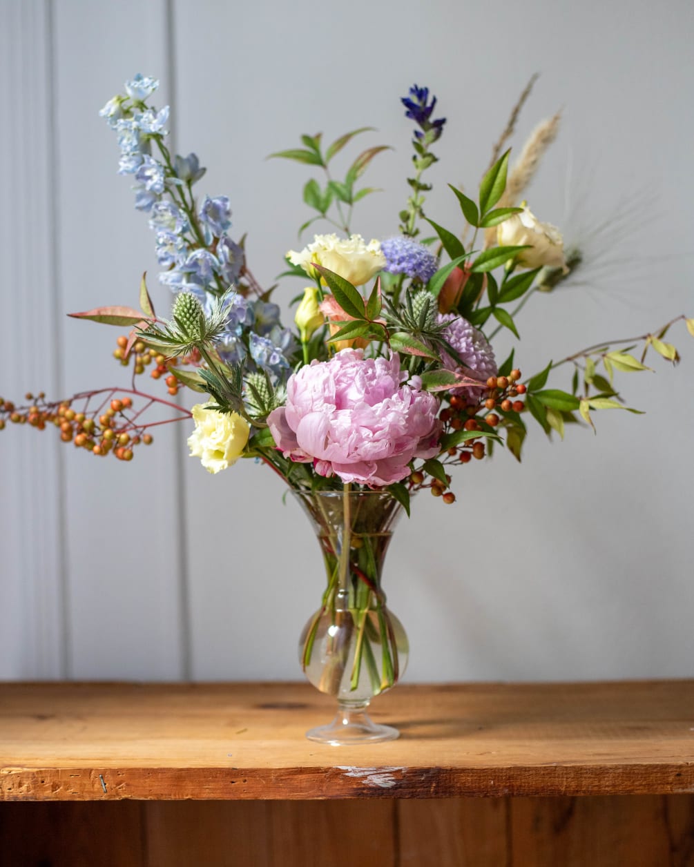 Premium floral arrangement designed with the highest quality flowers in white, pink