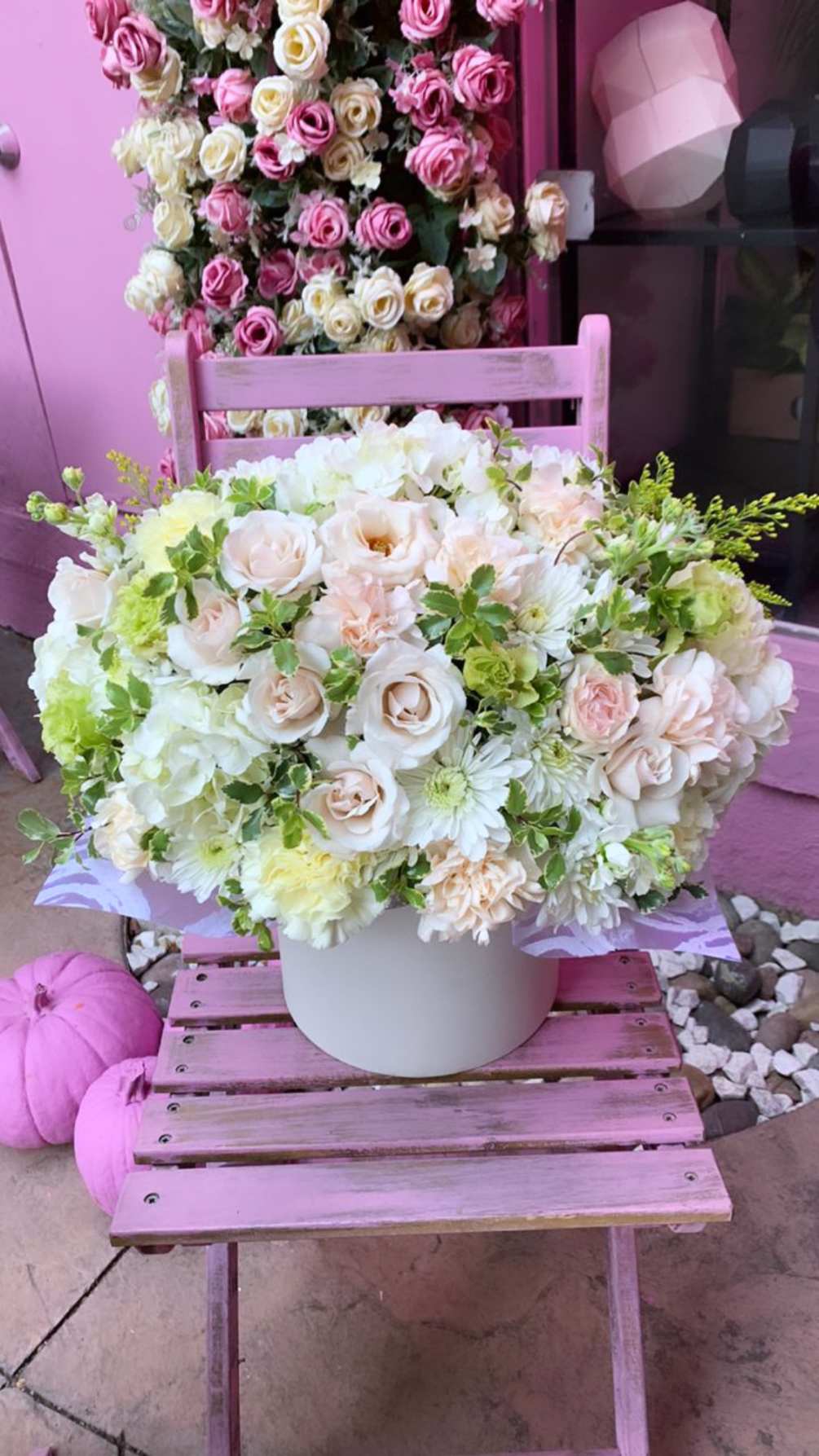 A delightful mix of roses, spray roses, and lush greenery that&#039;s perfect