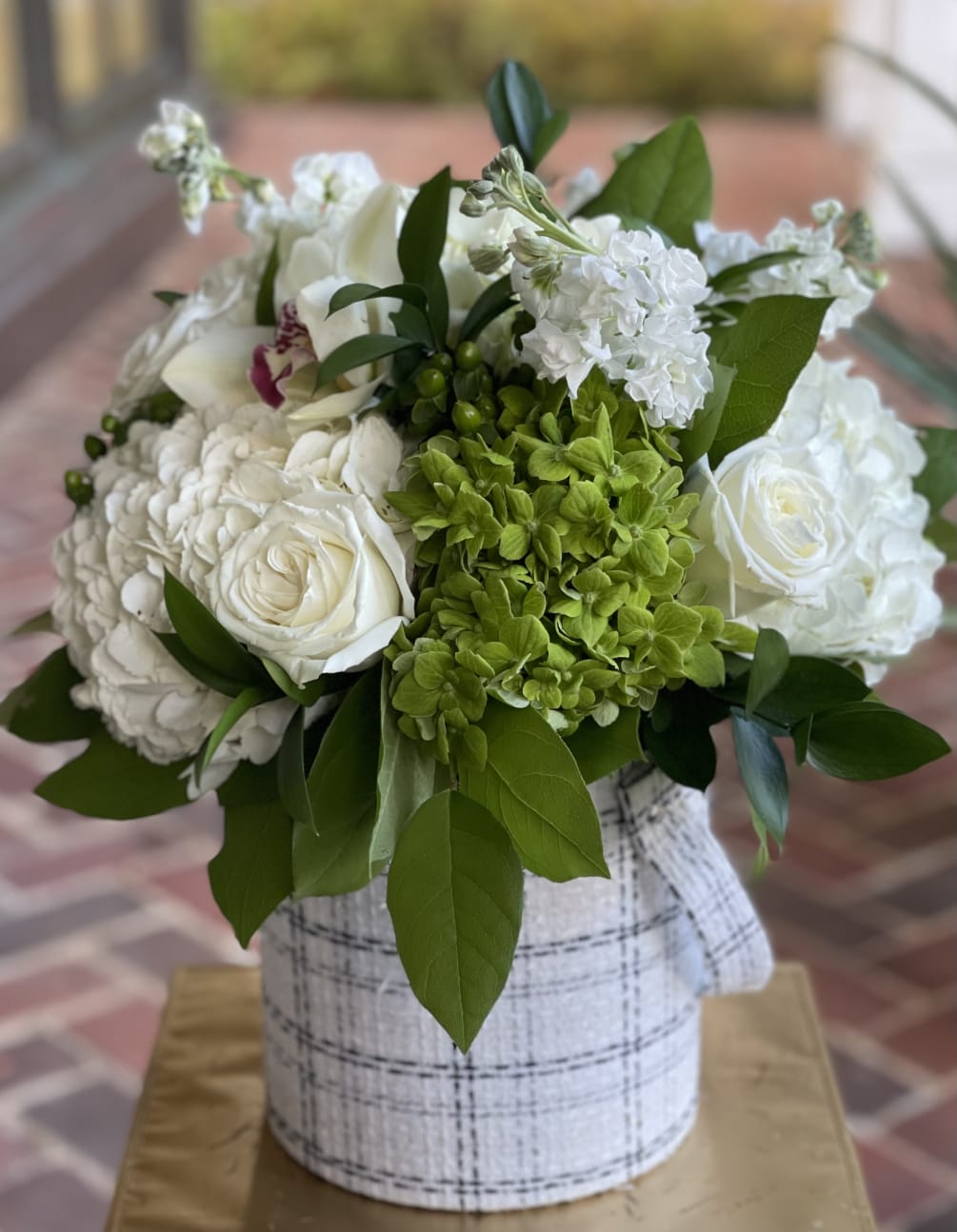 Same day, tax free hand delivery. This arrangement comes in a glass