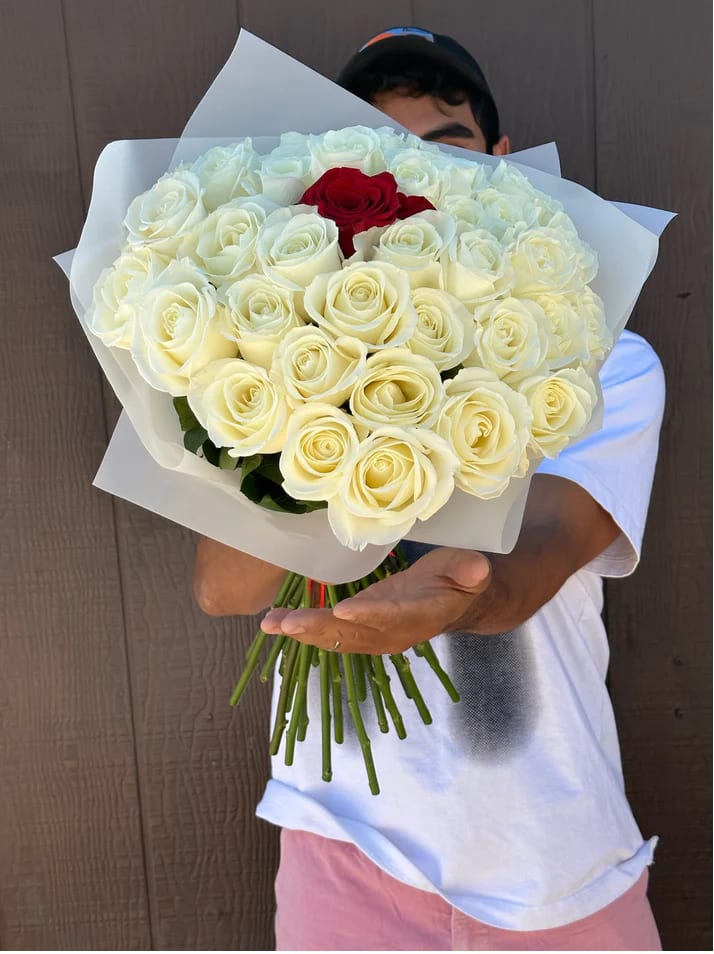 Simply put; premium roses arranged with the perfect spiral technique prepared to
