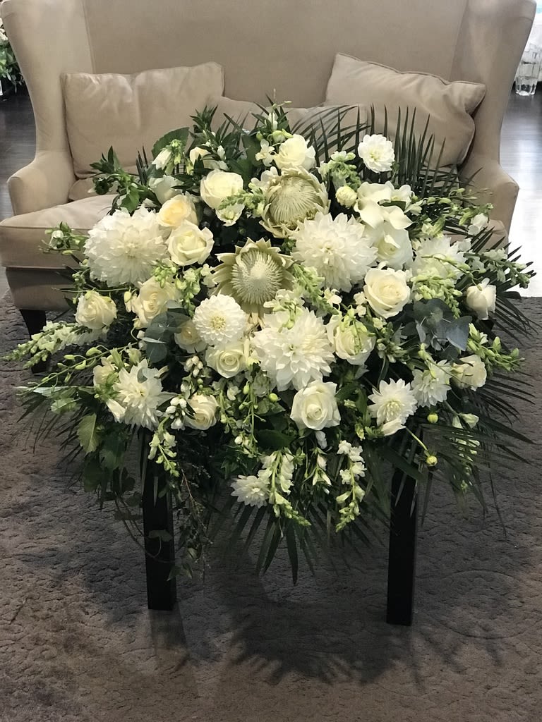 This bountiful arrangement serves a lovely variety of the largest blooms of