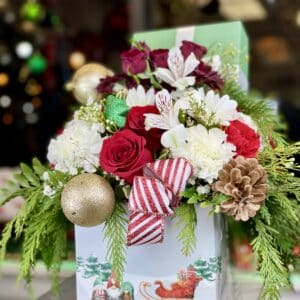 Box with Flowers and Christmas decoration balls