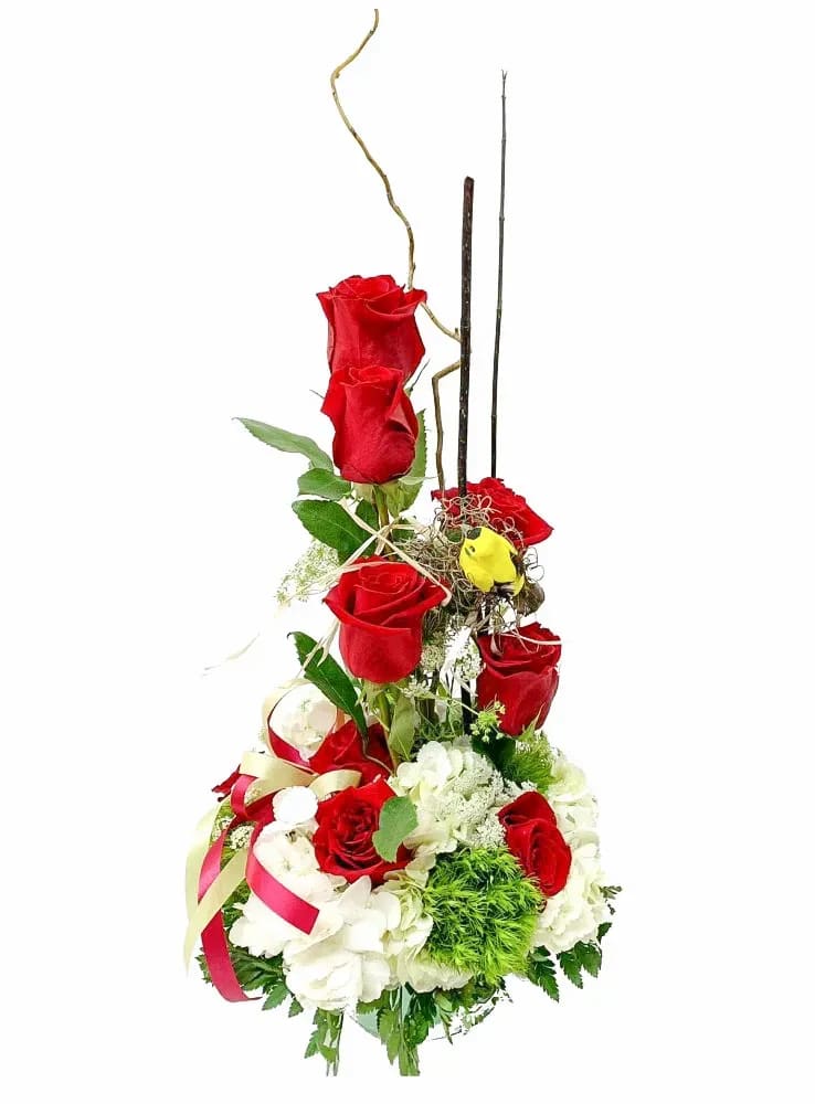 A rose arrangement design, includes hydrangeas.