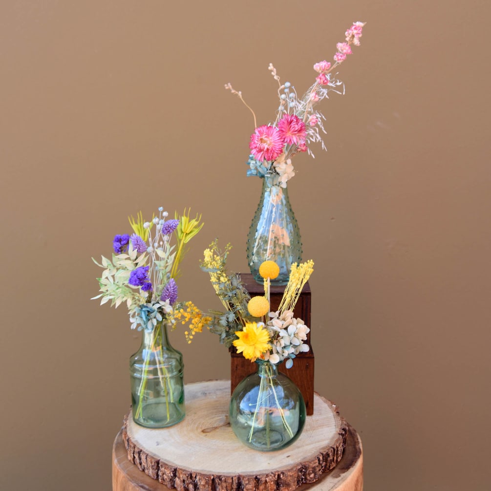 This sweet trio of glass vases with preserved flowers is a hassle-free