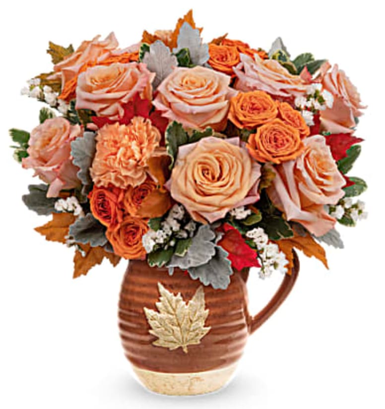 Nothing says fall quite like this bountiful bouquet of autumnal roses in