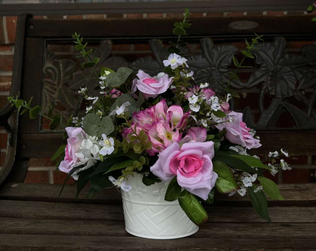 Aluminum bucket with pink and white flowers