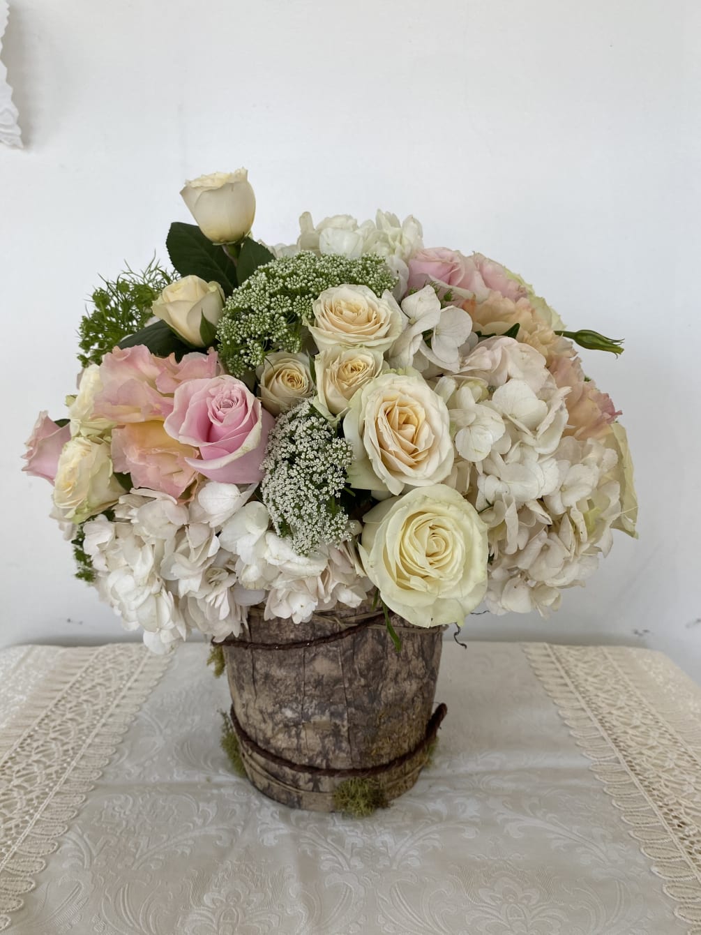 Seasonal  blush and white flower blend arranged in a custom made