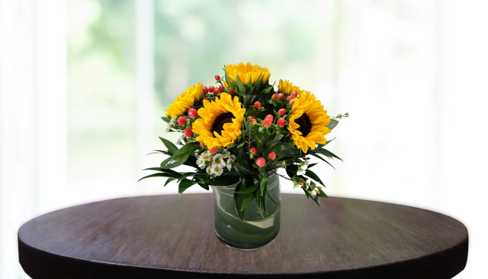 The Sunny Sunflower Vase Flower Arrangement shines like the sun in the