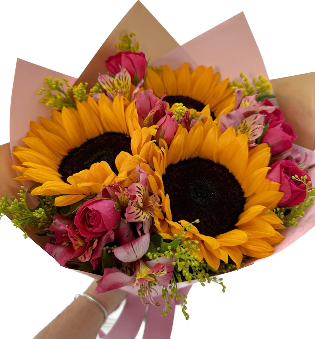 Hand wrapped sunflower arranged in wrapping paper with a colorful mix of
