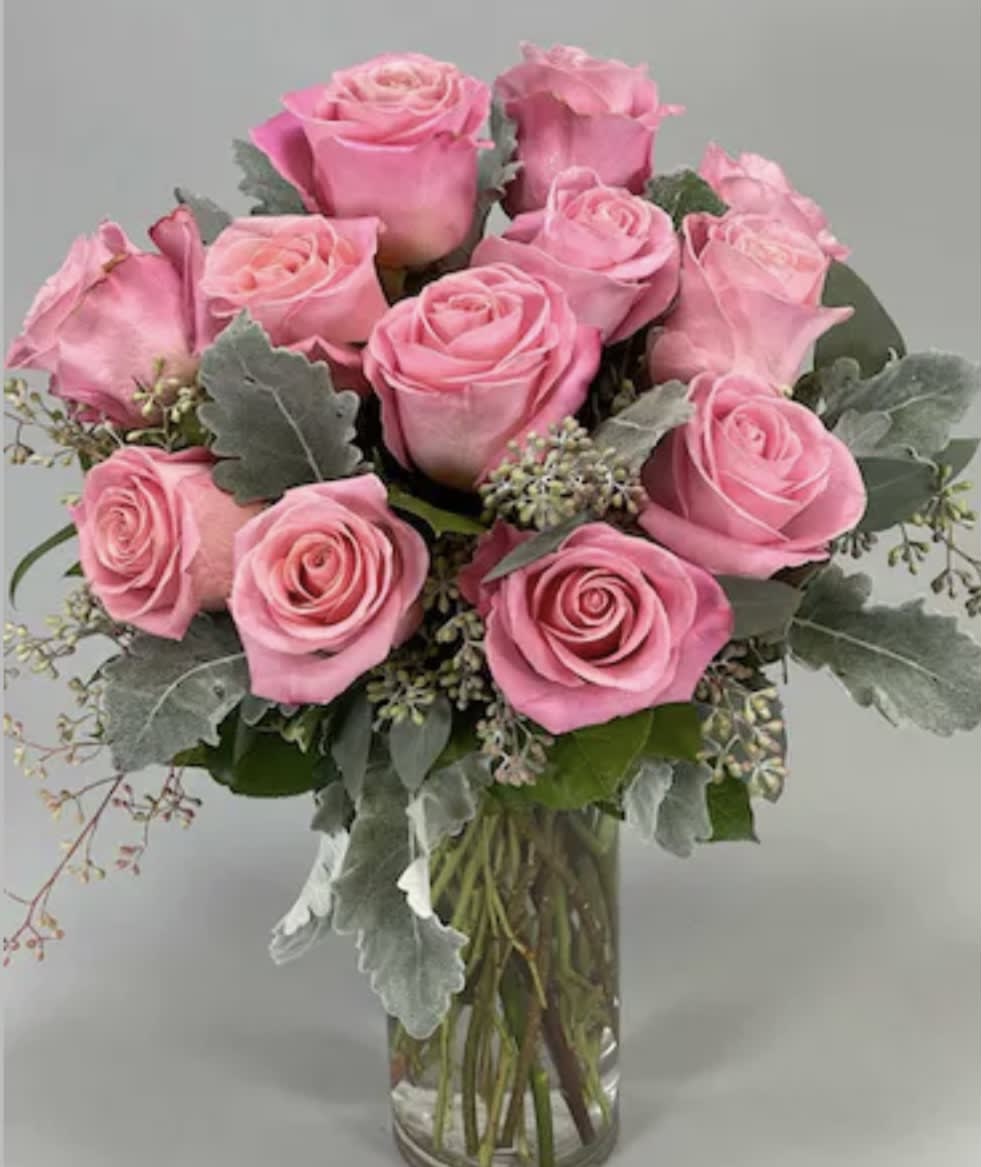 Dozen pink standard Roses for any occasion with Dusty Miller fillers