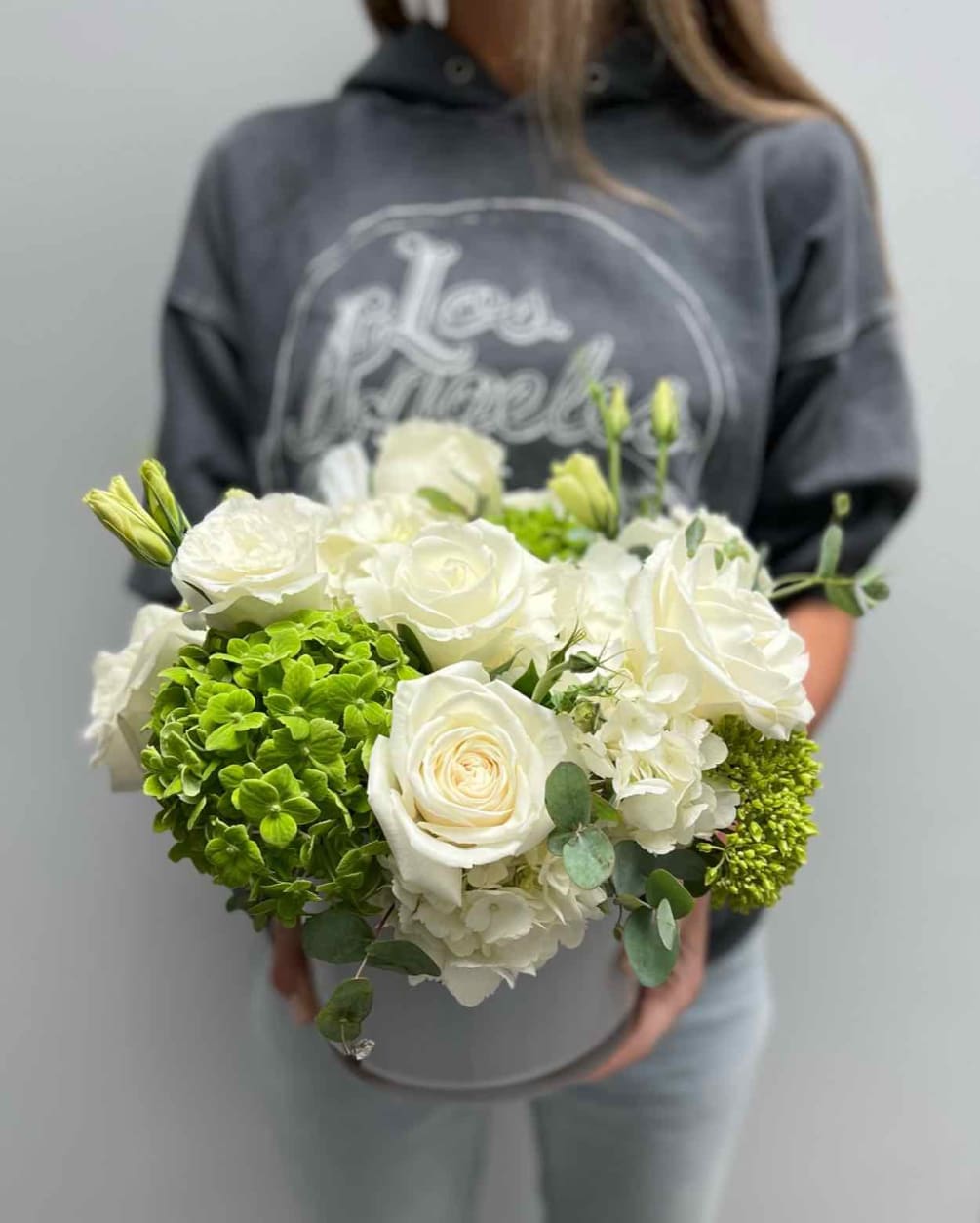 Vase of hydrangea, garden roses, carnations, lisianthus and eucalyptus.
Perfect for a dinner