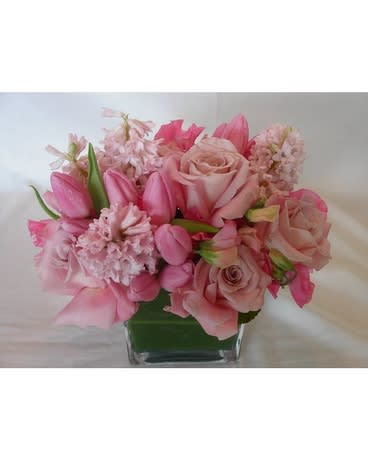 Introducing our Descanso Gardens, a stunning composition featuring delicate pink roses, vibrant